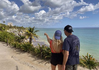 Kaylee of Gusto Mexico explains Mayan ruins at Tulum